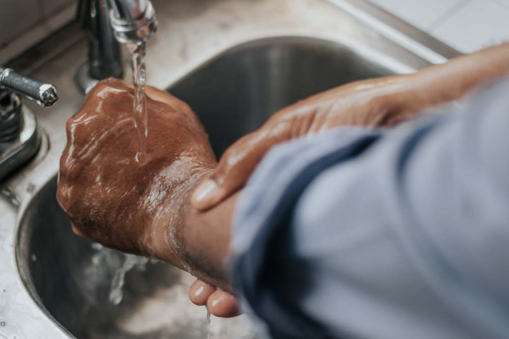a man washing his hands